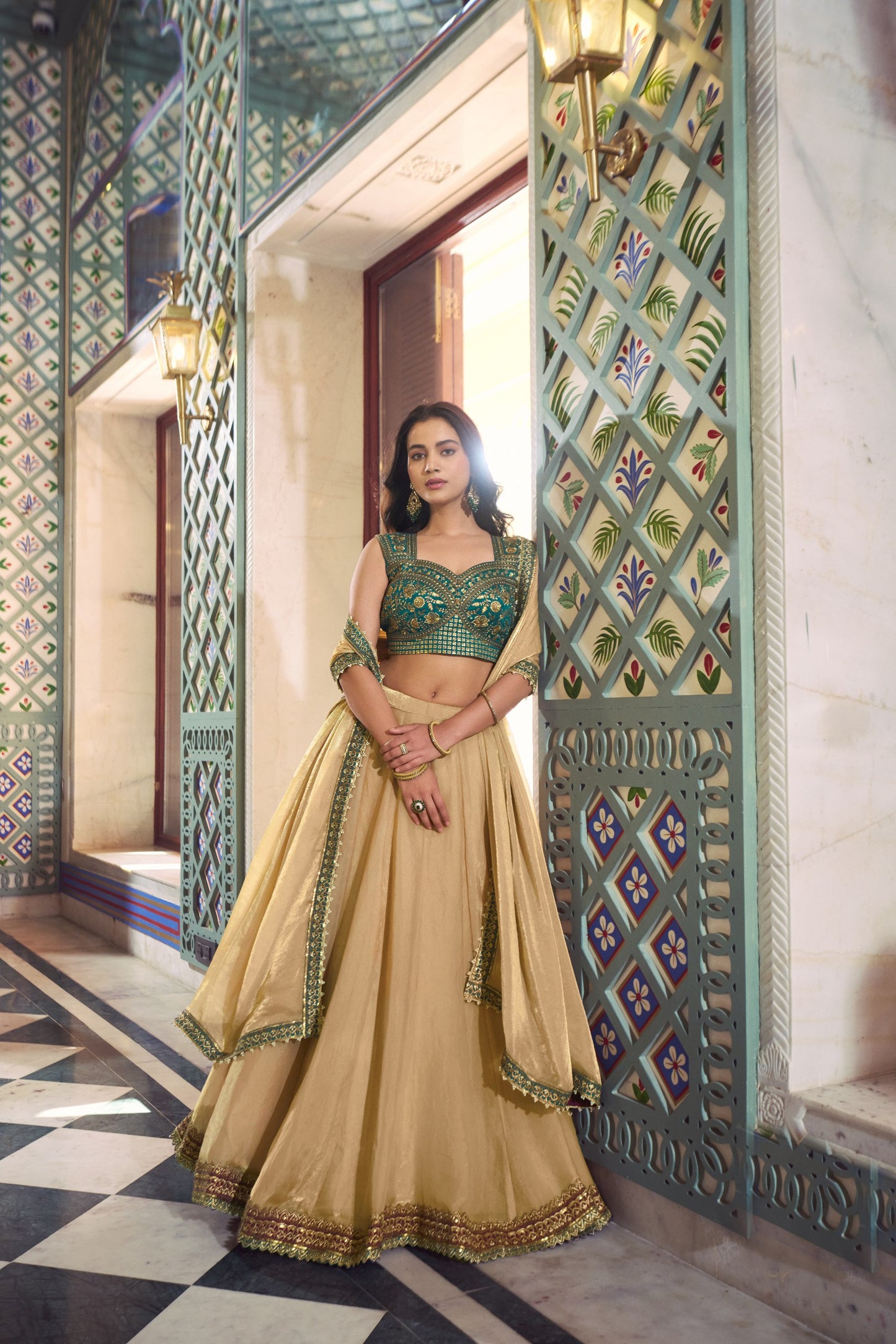 Beige Flared Lehenga Set With Emerald Green Zari Embroidered Blouse And Dupatta