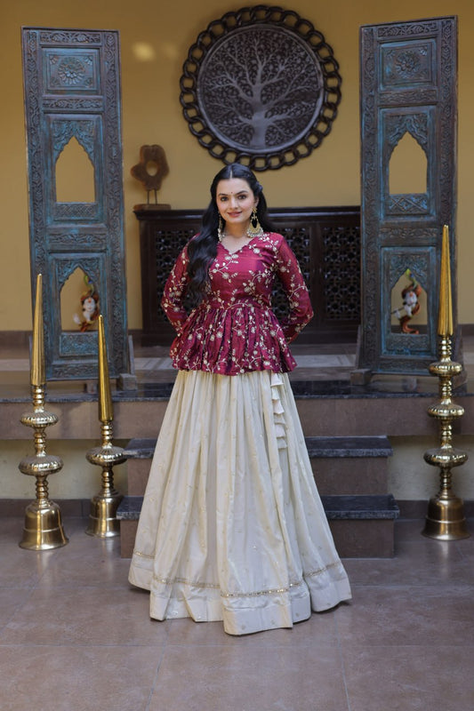 Wine Floral Embroidered Peplum Top With Off-White Lehenga Skirt Set
