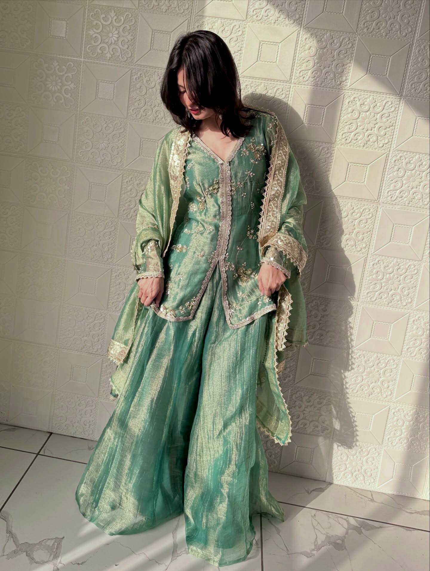 Elegant Green Sharara Suit With Gold Embroidery And Lace