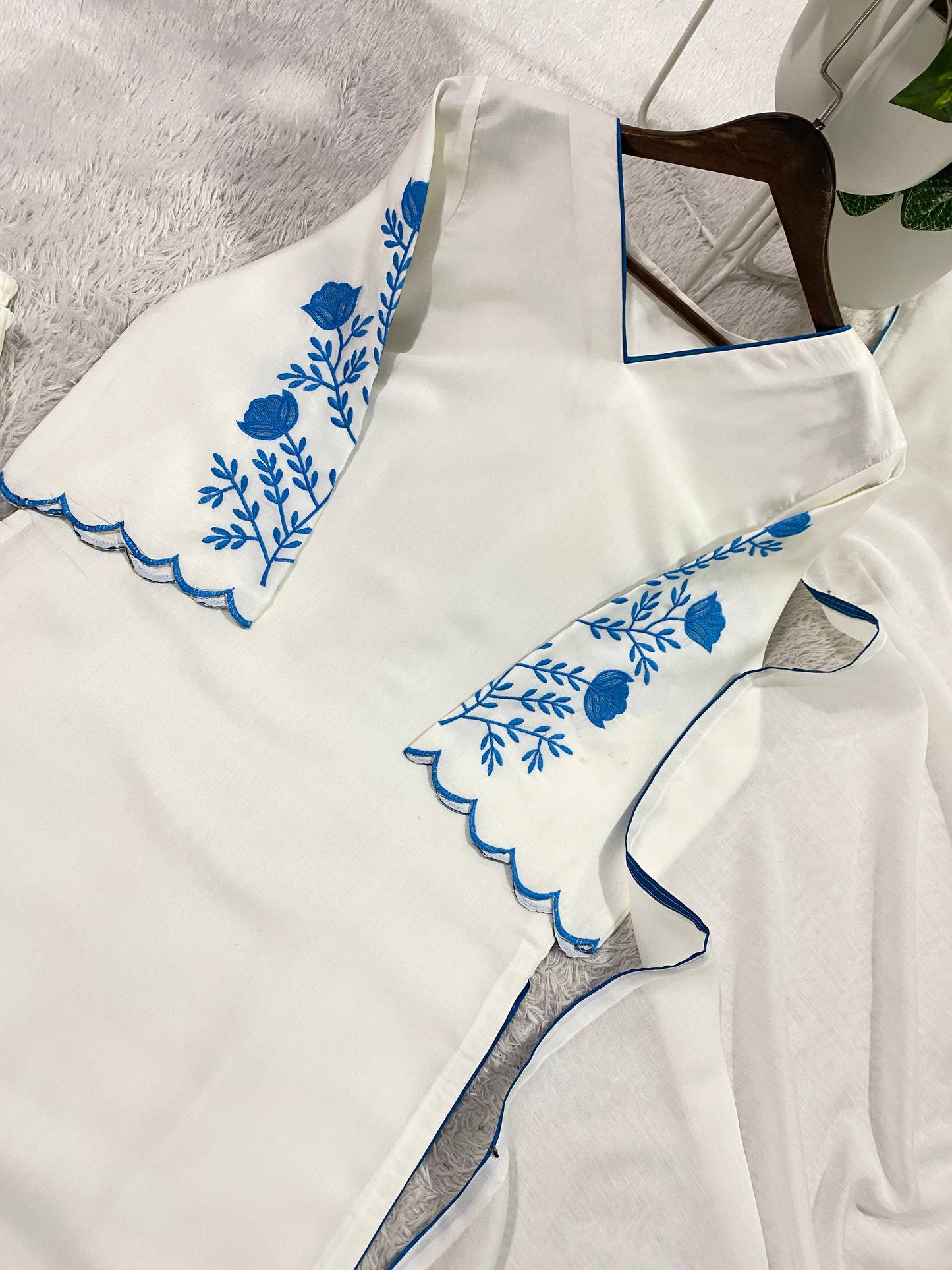 Elegant White Roman Silk Kurti With Blue Floral Embroidery On Sleeves And Matching Dupatta