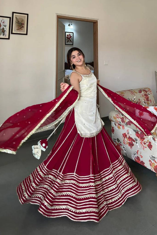 Off White Sleeveless Top And Lehenga With Dupatta