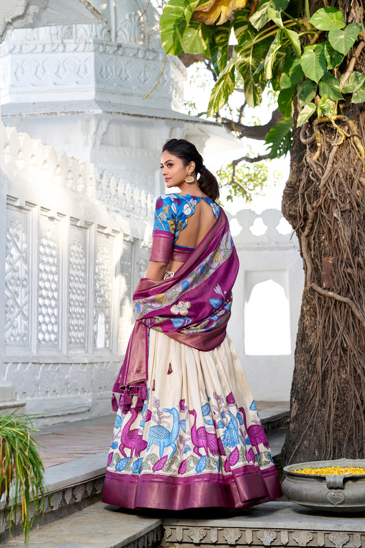 Jacquard Dola Silk Kalamkari Printed Lehenga Choli with Zari Border – ANUSHA (PDLNB1234OWT)