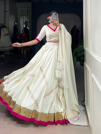 White Lehenga Choli With Golden Zari And Pink Border