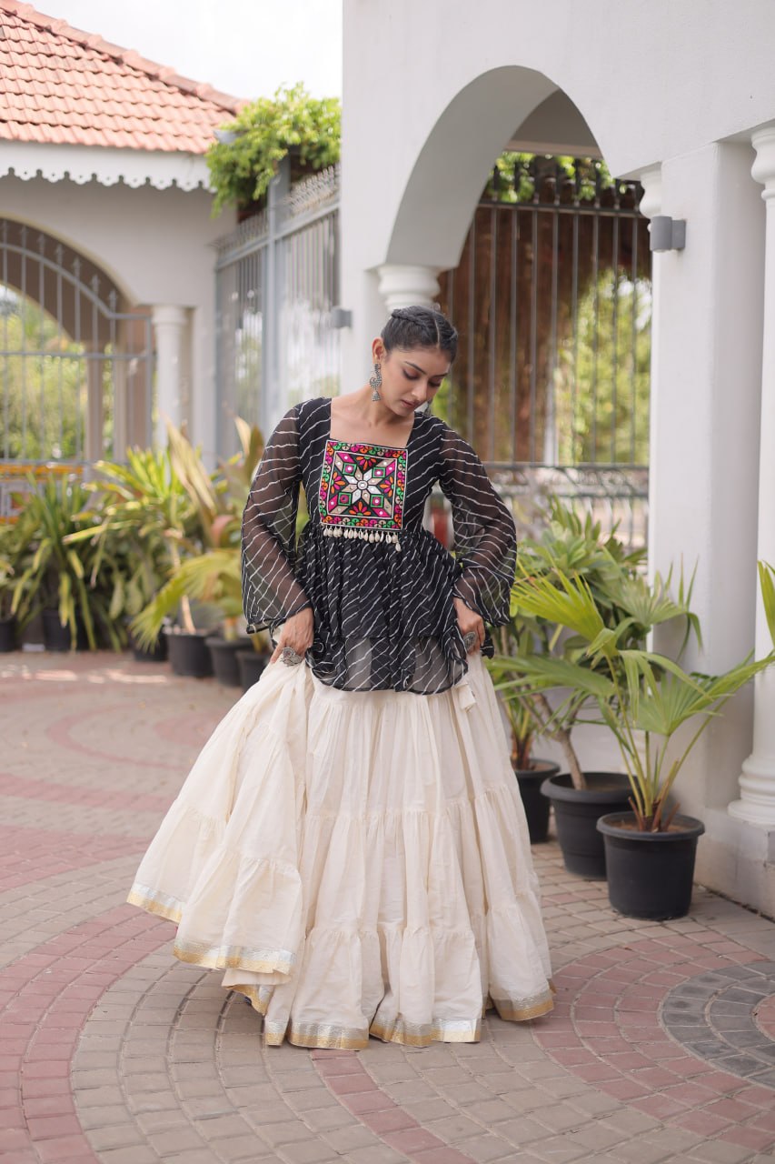 12 Meter Layered Flared Lehenga Choli With Kutchi Mirror Work And Leheriya Ruffle Top