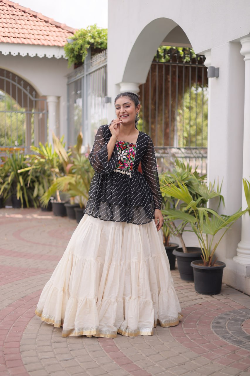 12 Meter Layered Flared Lehenga Choli With Kutchi Mirror Work And Leheriya Ruffle Top