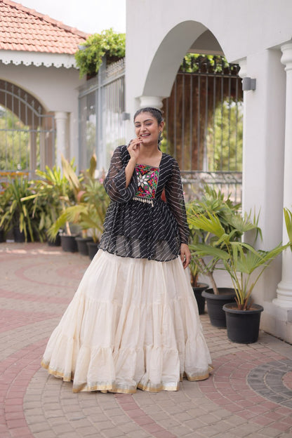 12 Meter Layered Flared Lehenga Choli With Kutchi Mirror Work And Leheriya Ruffle Top