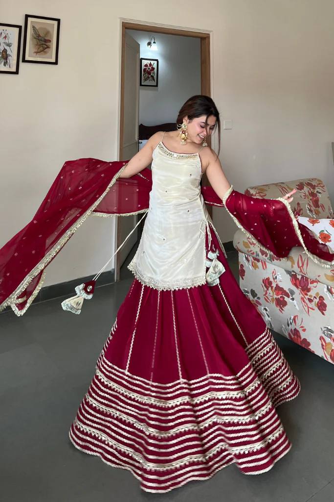 Off White Sleeveless Top And Lehenga With Dupatta