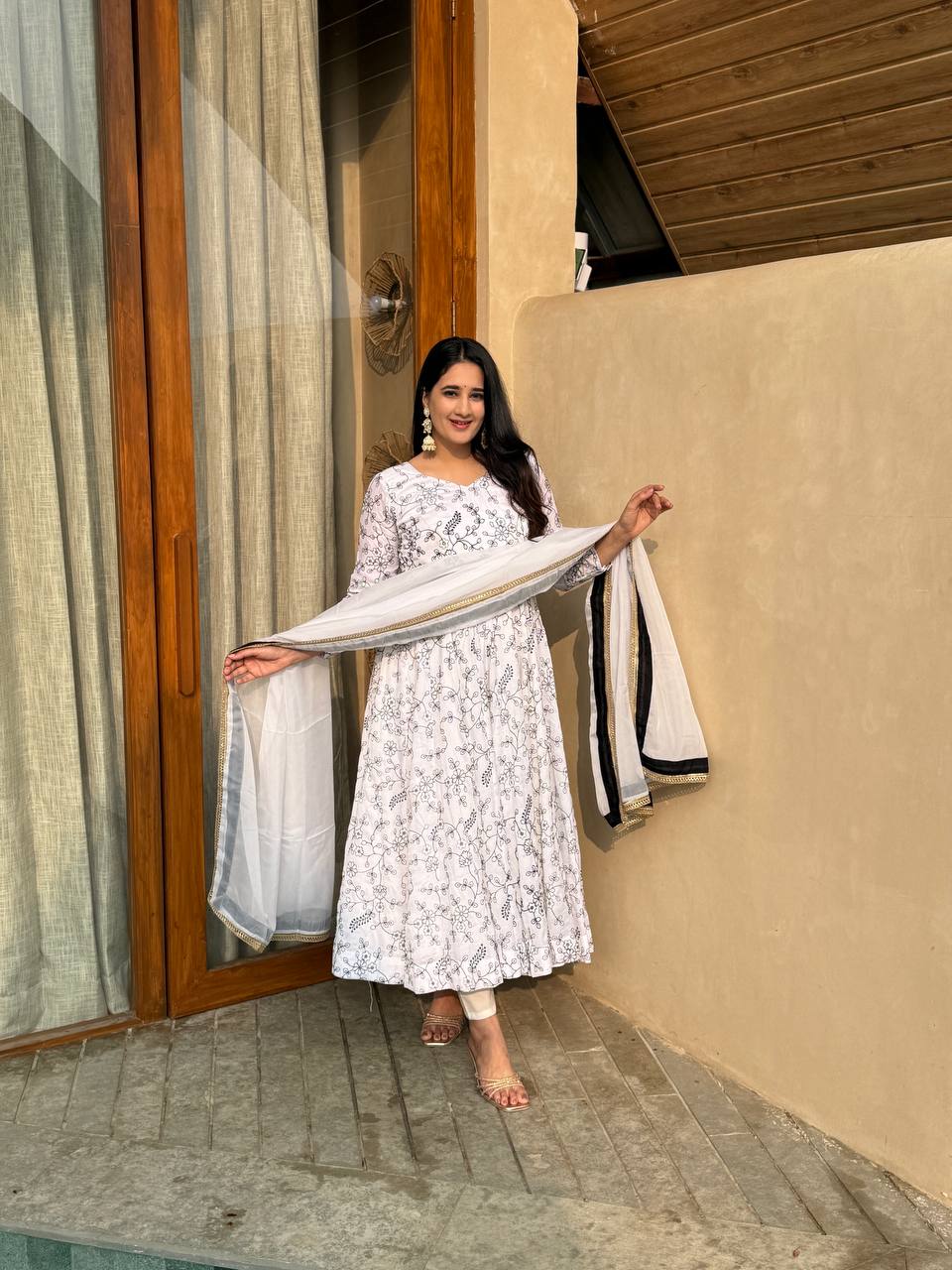 White Floral Anarkali Suit With Black And Gold Embroidery Dupatta