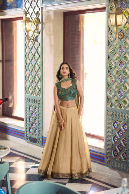 Beige Flared Lehenga Set With Emerald Green Zari Embroidered Blouse And Dupatta