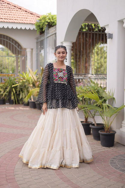 12 Meter Layered Flared Lehenga Choli With Kutchi Mirror Work And Leheriya Ruffle Top