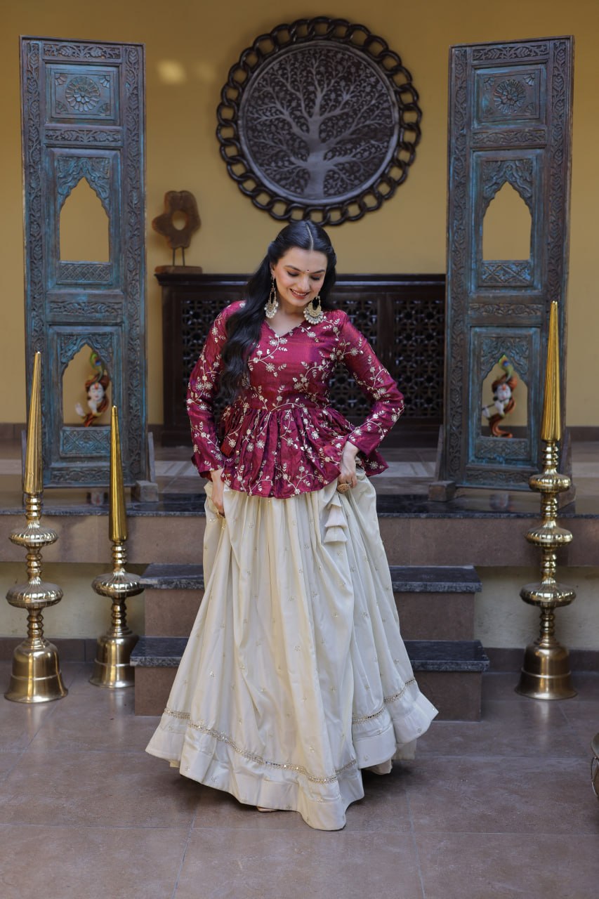 Wine Floral Embroidered Peplum Top With Off-White Lehenga Skirt Set