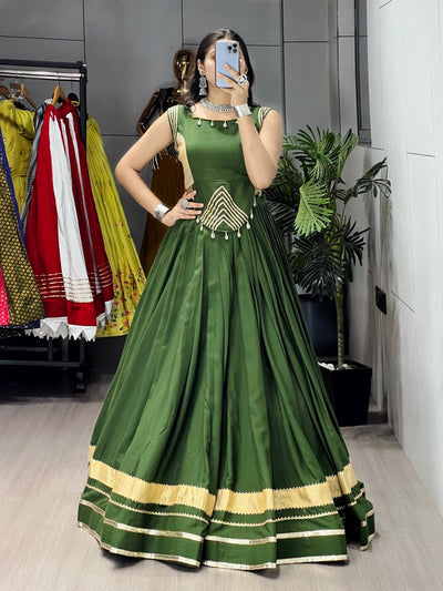 ELEGANT BOTTLE GREEN LEHENGA WITH GOLDEN BORDER