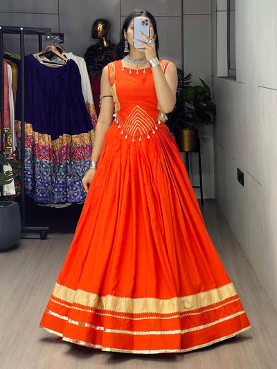 RADIANT ORANGE ETHNIC LEHENGA WITH GOLDEN ACCENTS