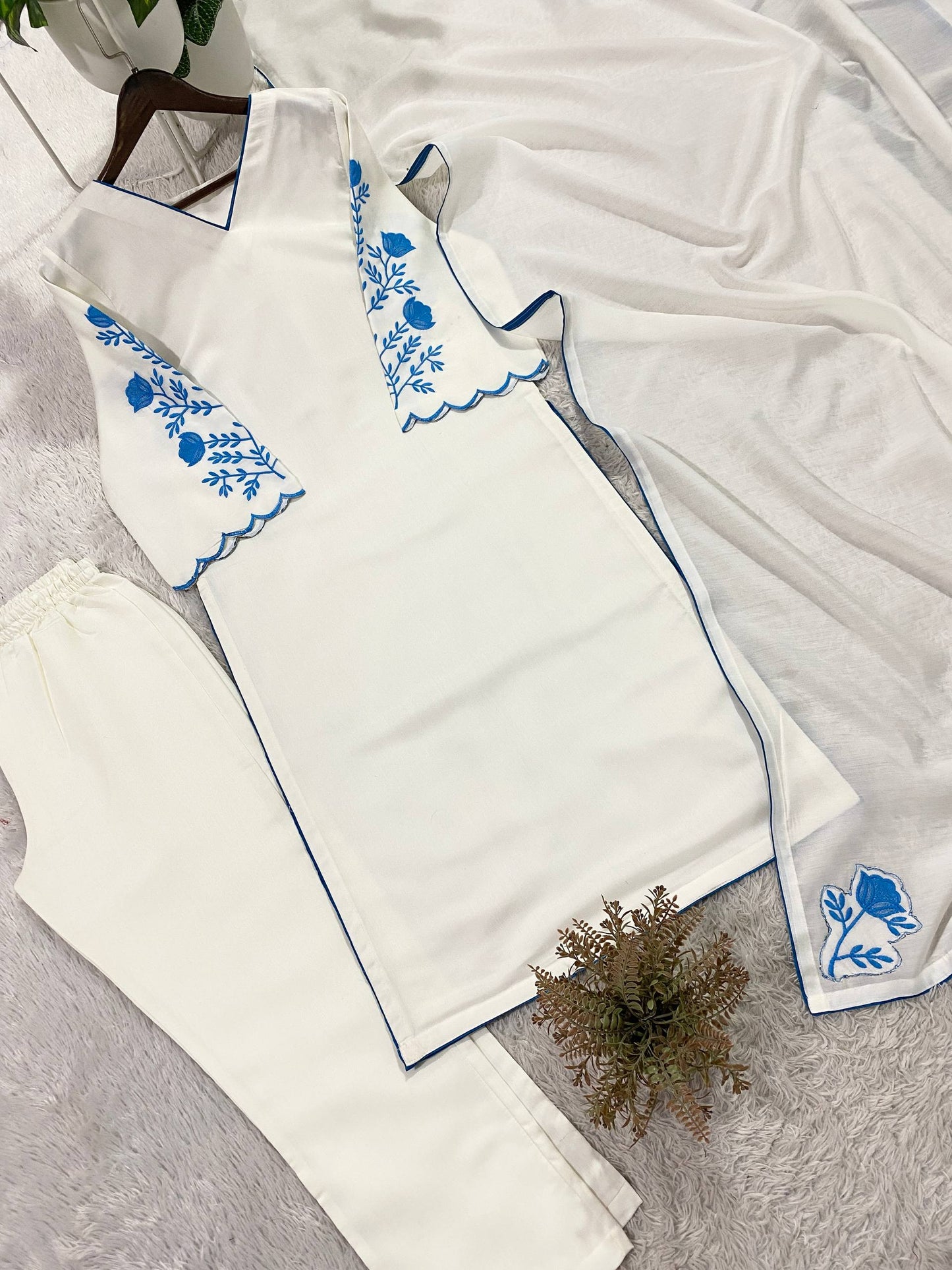 Elegant White Roman Silk Kurti With Blue Floral Embroidery On Sleeves And Matching Dupatta