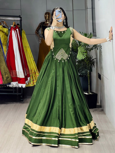 ELEGANT BOTTLE GREEN LEHENGA WITH GOLDEN BORDER