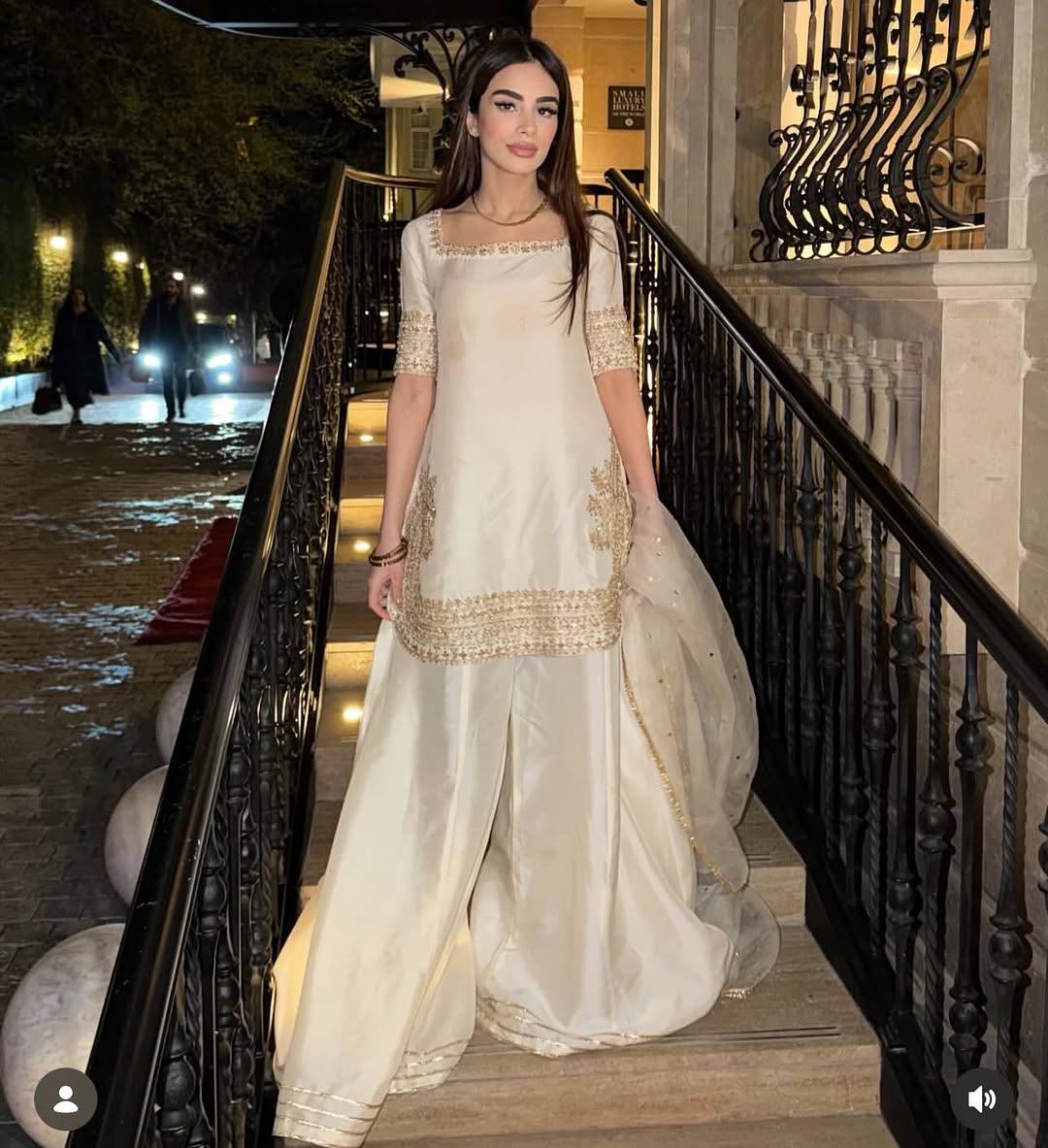 Elegant White Sharara Suit With Golden Embroidery And Net Dupatta