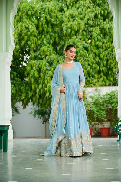 Light Blue Anarkali Gown With Golden Embroidery And Flared Design