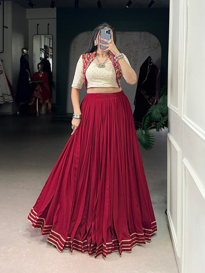 ELEGANT MAROON PLEATED LEHENGA WITH CREAM BLOUSE AND MIRROR-WORK JACKET