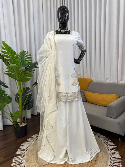 Elegant White Sharara Suit With Golden Embroidery And Net Dupatta