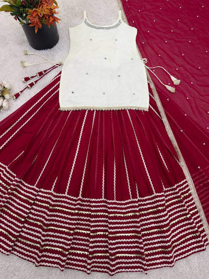 Off White Sleeveless Top And Lehenga With Dupatta
