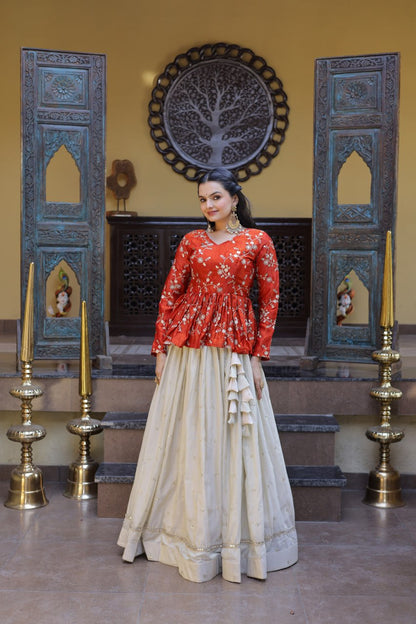 Orange Floral Embroidered Peplum Top With Off-White Lehenga Skirt Set