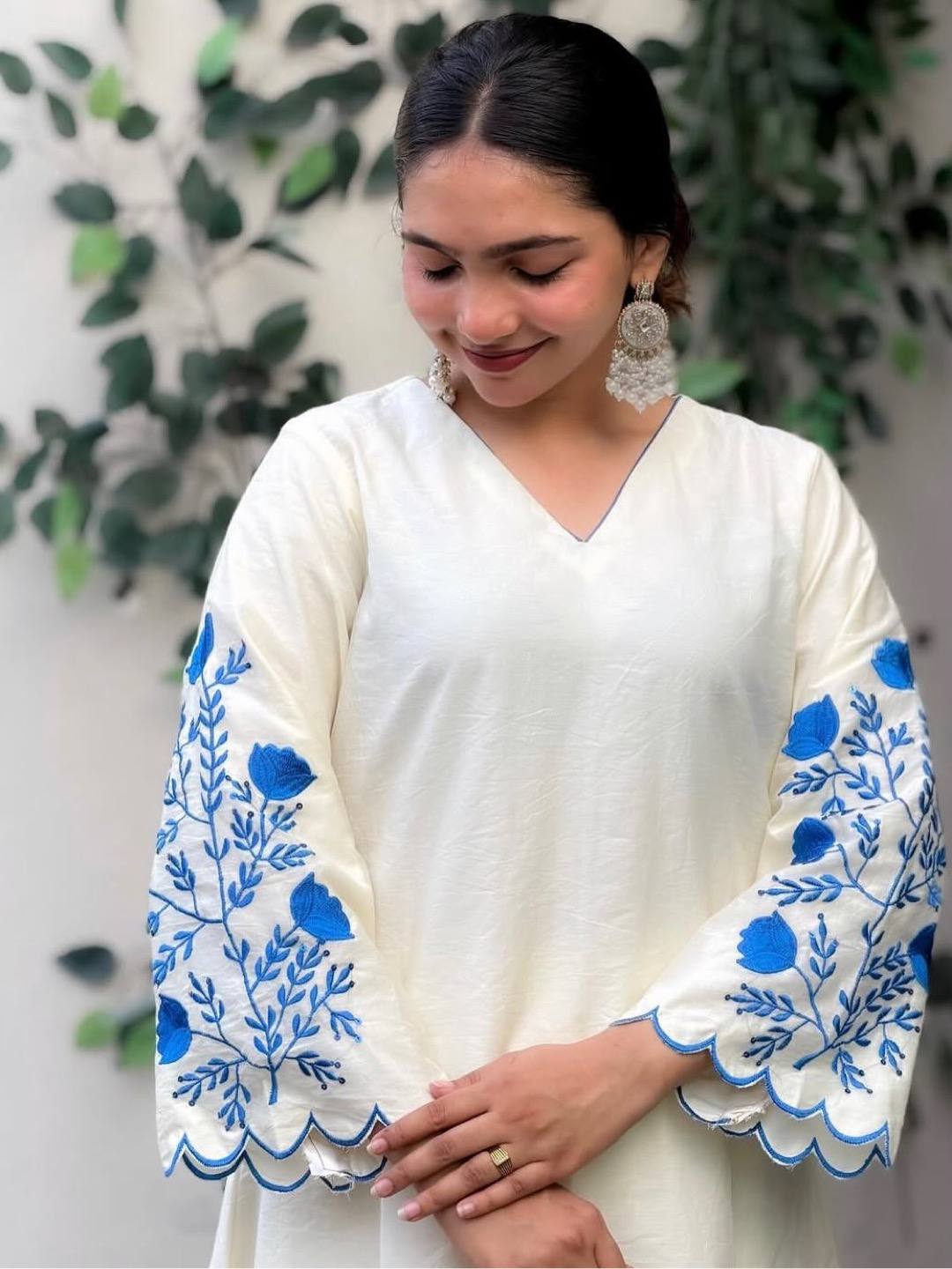 Elegant White Roman Silk Kurti With Blue Floral Embroidery On Sleeves And Matching Dupatta