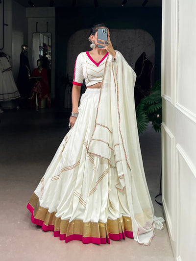 White Lehenga Choli With Golden Zari And Pink Border