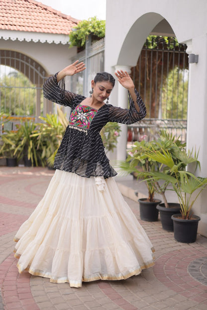 12 Meter Layered Flared Lehenga Choli With Kutchi Mirror Work And Leheriya Ruffle Top