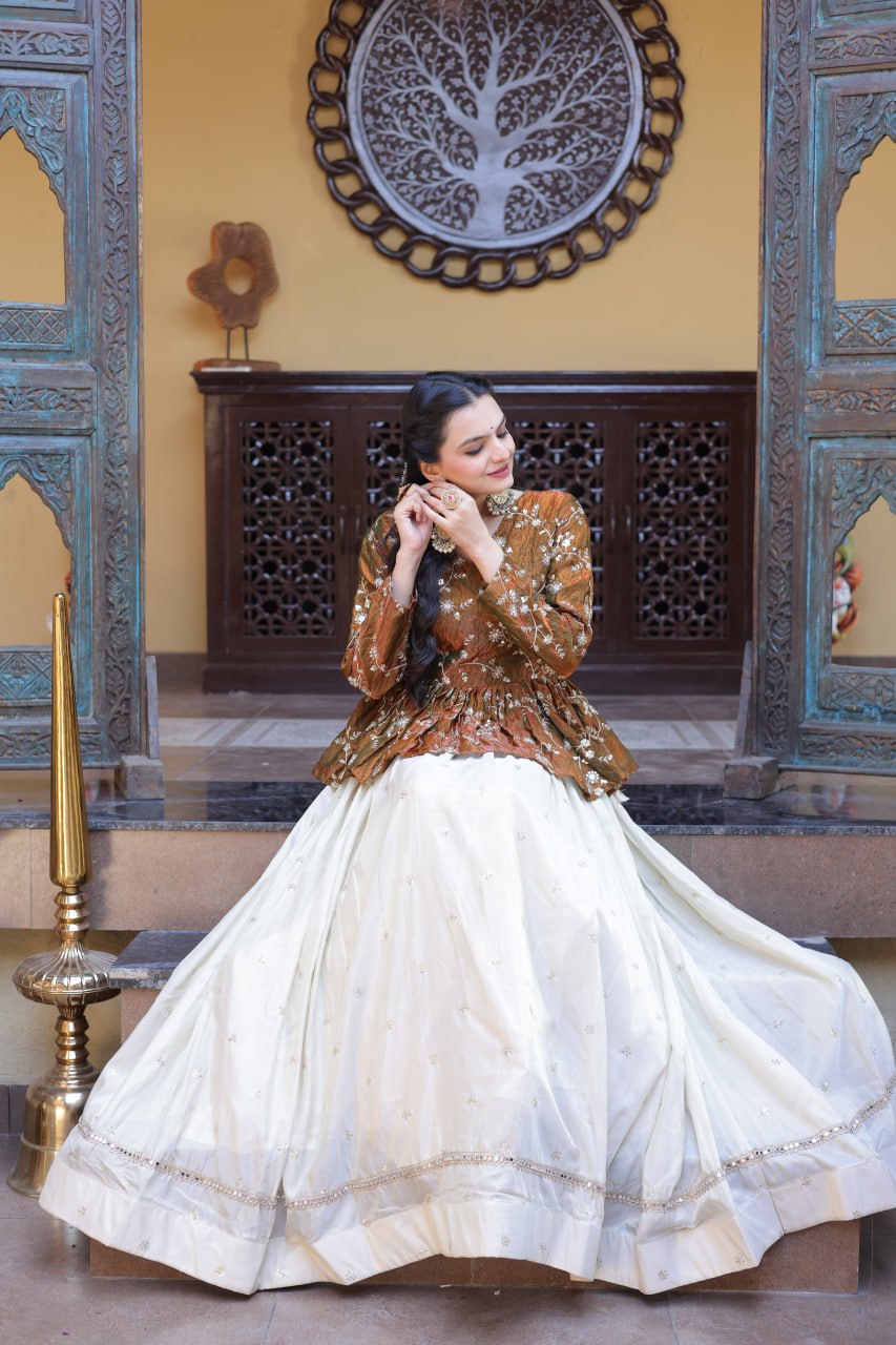 Rust Gold Floral Embroidered Peplum Top With Off-White Lehenga Skirt Set