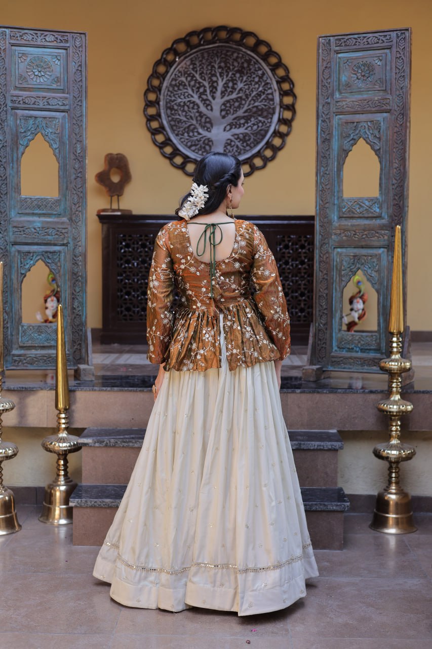 Rust Gold Floral Embroidered Peplum Top With Off-White Lehenga Skirt Set