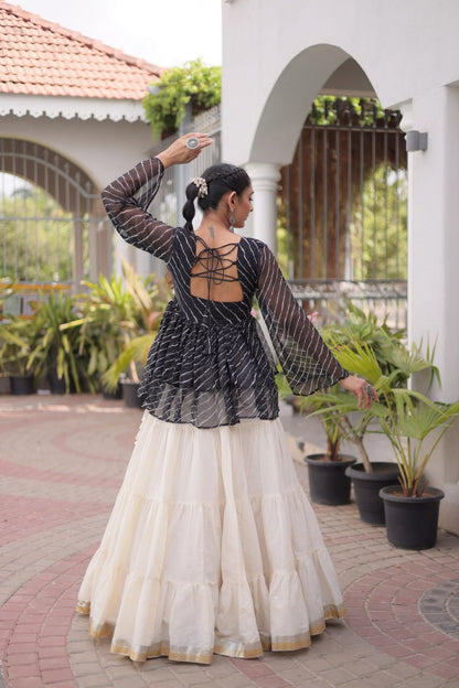 12 Meter Layered Flared Lehenga Choli With Kutchi Mirror Work And Leheriya Ruffle Top