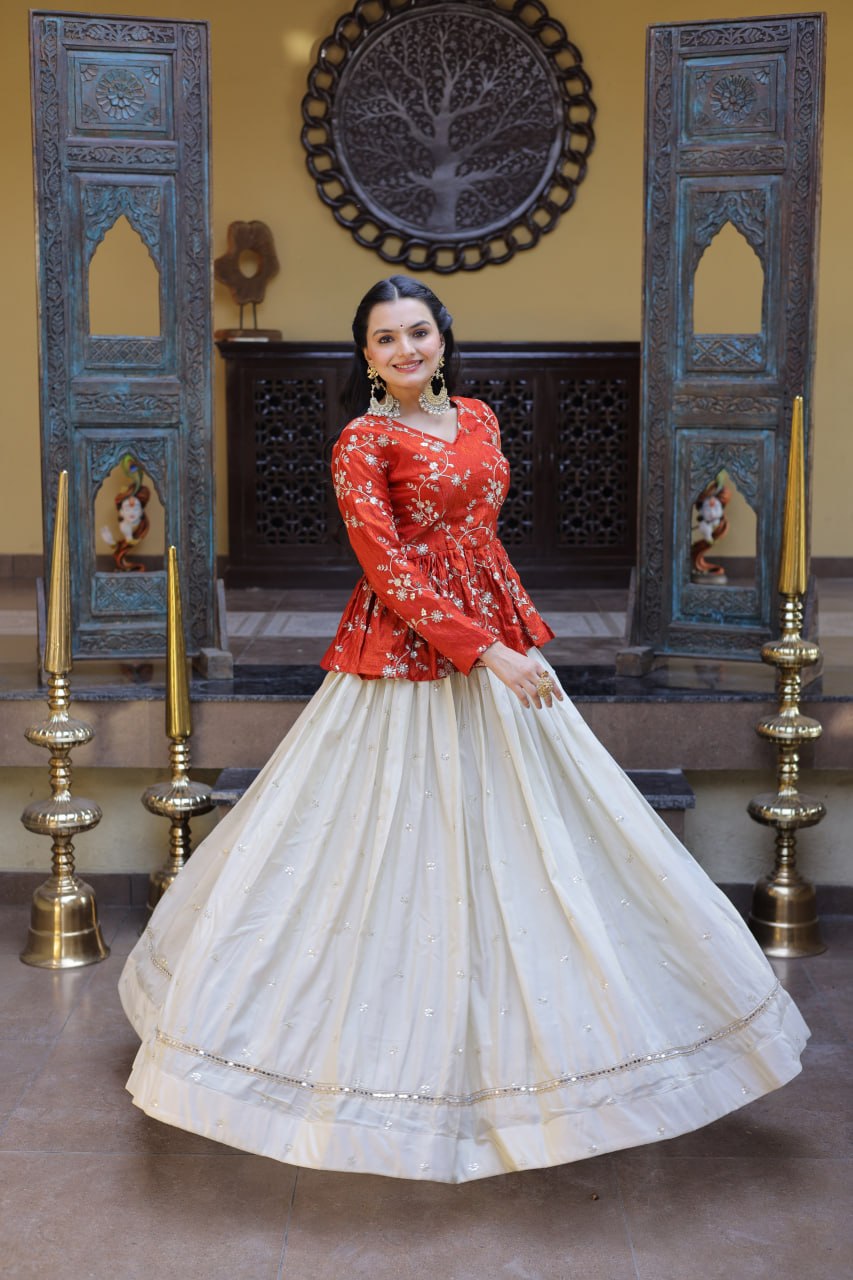 Orange Floral Embroidered Peplum Top With Off-White Lehenga Skirt Set
