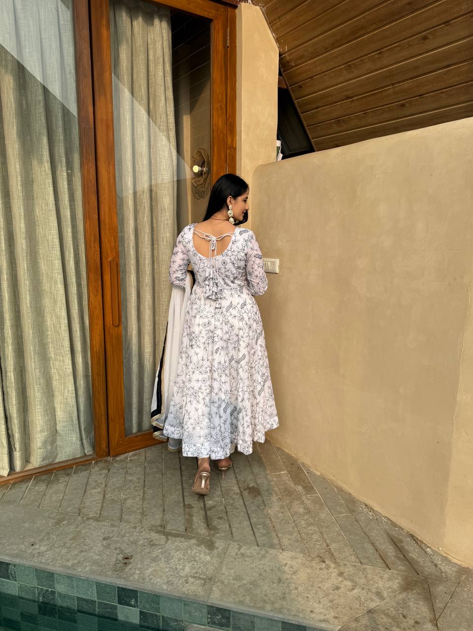 White Floral Anarkali Suit With Black And Gold Embroidery Dupatta