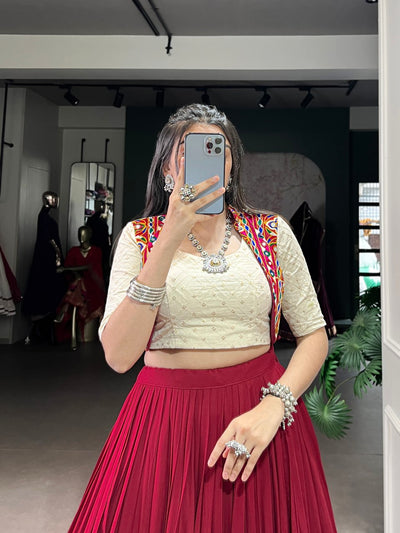 ELEGANT MAROON PLEATED LEHENGA WITH CREAM BLOUSE AND MIRROR-WORK JACKET