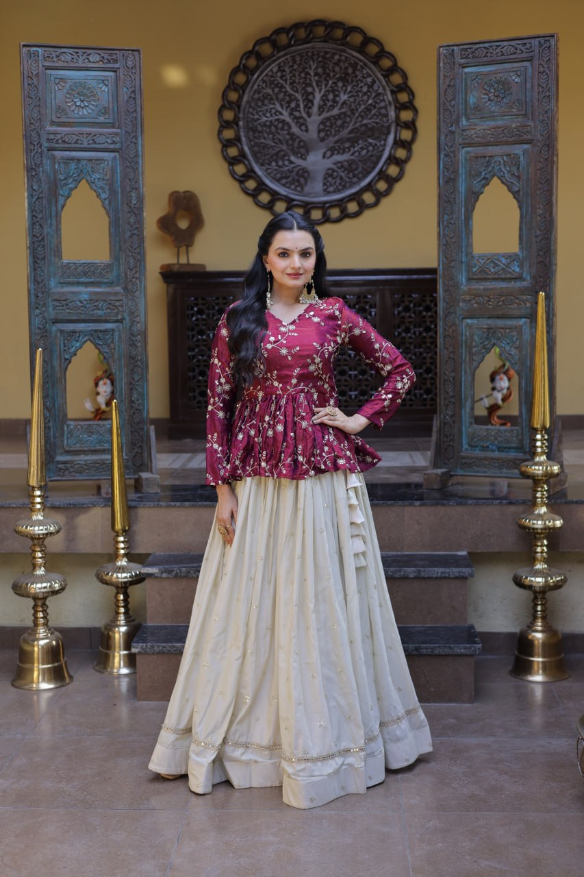Wine Floral Embroidered Peplum Top With Off-White Lehenga Skirt Set