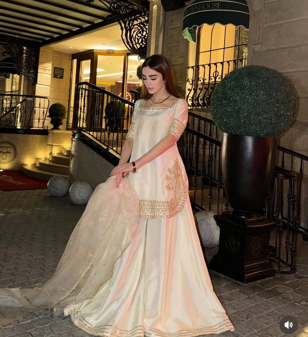 Elegant White Sharara Suit With Golden Embroidery And Net Dupatta