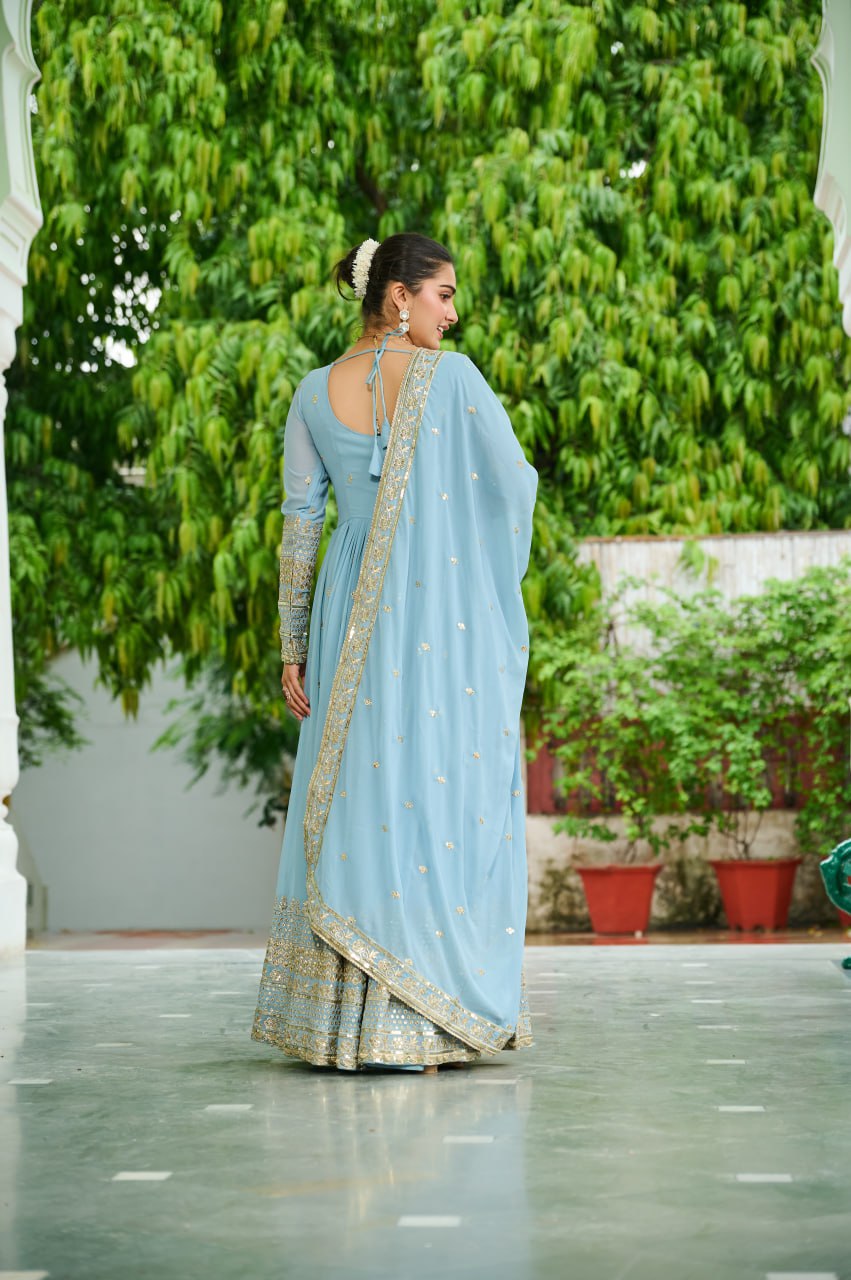 Light Blue Anarkali Gown With Golden Embroidery And Flared Design