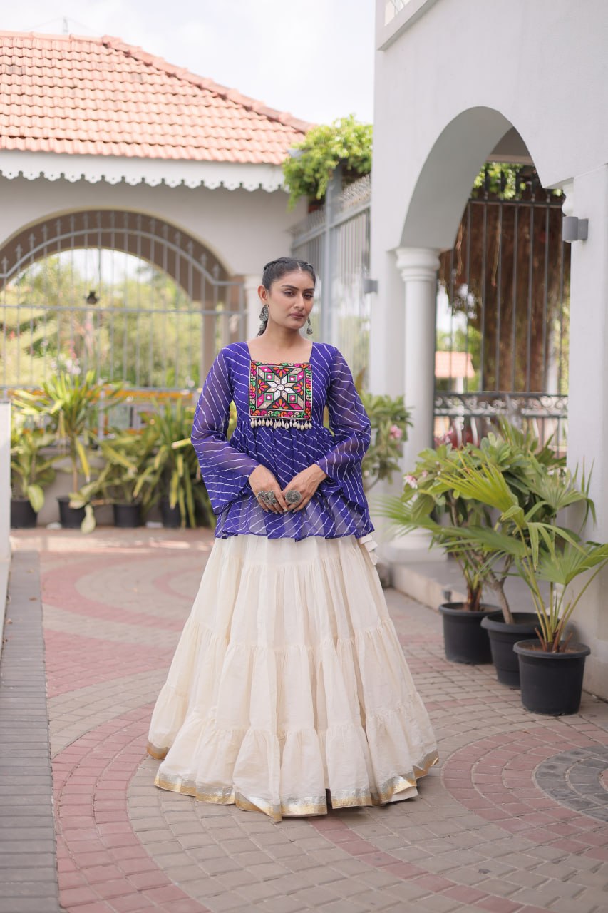 12 Meter Layered Flared Lehenga Choli With Kutchi Mirror Work And Leheriya Ruffle Top