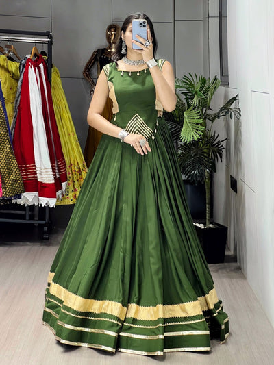 ELEGANT BOTTLE GREEN LEHENGA WITH GOLDEN BORDER